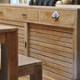 Capri massiver Waschtisch aus Teak hier in der Abbildung Verwendung als schoenes Sideboard, Massivholz Moebel nach Mass in der MOEBEL KOLONIE Farbe Roh und in glatter Ausfuehrung, auch in der rustic Ausfuehrung und in anderen Farben moeglich, mediterranes Flair fuer das Badezimmer mit Massivholz Teak Moebel nach Mass, Muenchen Moebel