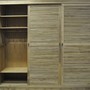 Innenleben in Form von 2 Regal Faechern und einer Kleider Stange und einem Boden Fach, individuell konfigurierbar, geoeffnete Schiebe Tuere in Shutter Optik, Massivholz Schrank Lund aus edlem Teak Holz, gefertigt vom Schreiner in Handarbeit, Schrank nach Mass aus Teakholz, Muenchen Moebel aus Massivholz