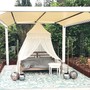 Massivholz Daybed Bora Bora aus Teak, Schreiner Meisterstueck in Handarbeit gefertigt, edles Daybed Teakholz im modernen, mediterranen Stil, fuer Indoor und Outdoor geeignet, Dekoration mit exklusivem Outdoor Teppich, massives Teakholzmoebel in der MOEBEL KOLONIE Manufaktur gefertigt, stilvoller Baldachin aus weissem Stoff, Muenchen Moebel